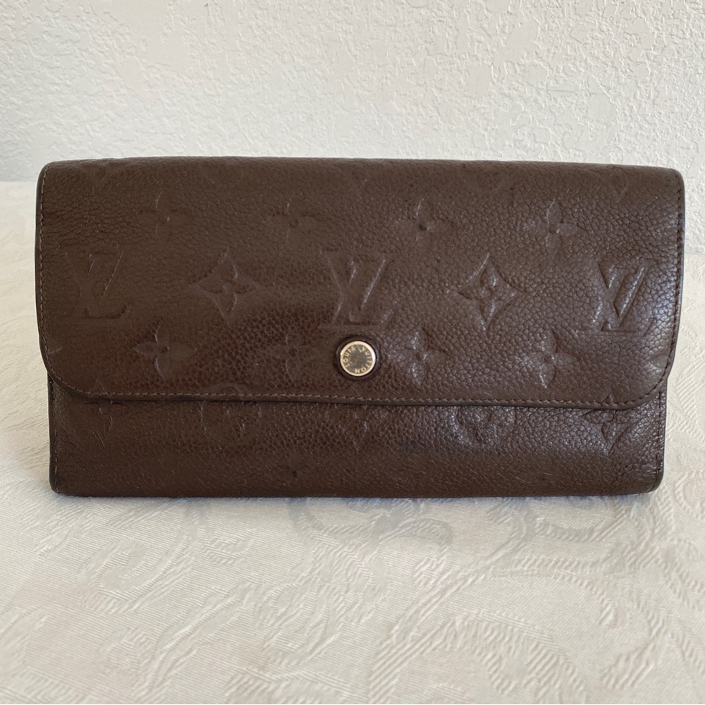 LOUIS VUITTON brown 
Empreinte Virtuose Wallet